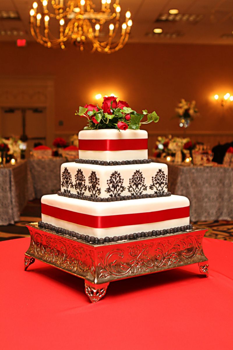 Red and Black Three Tiered Cake from Nichole's Fine Pastry, Fargo, ND - photo credit: Frozen Music Studios Photography