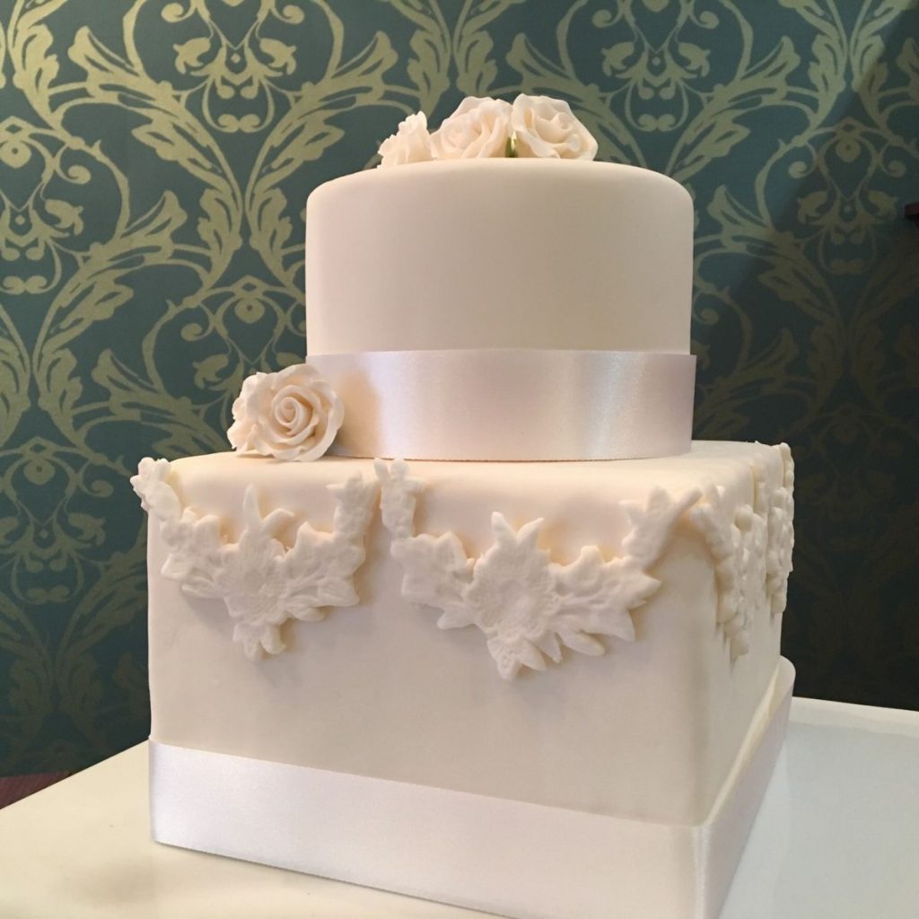 Simple in White Wedding Cake at Nichole's Fine Pastry, Fargo, ND